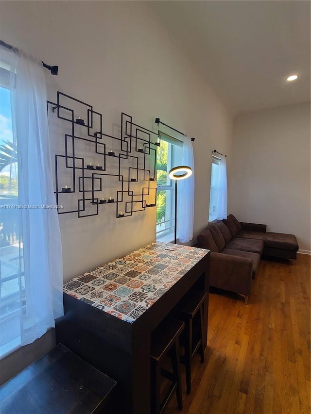 interior space with wood finished floors and recessed lighting