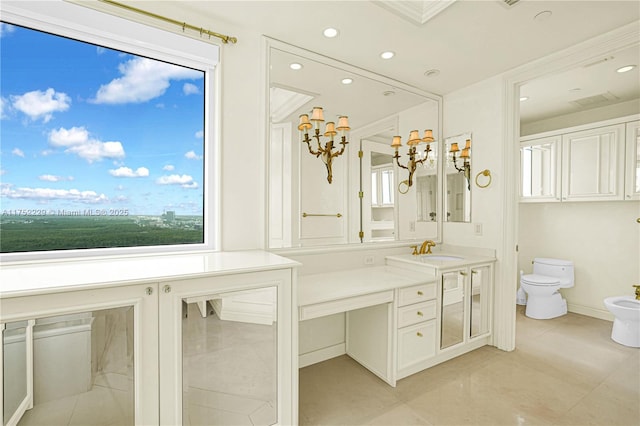 bathroom with toilet, plenty of natural light, a bidet, and tile patterned flooring