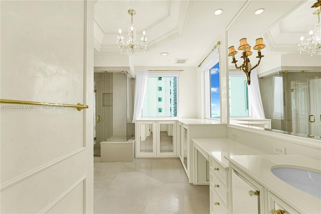 bathroom featuring a shower stall, ornamental molding, a raised ceiling, and a notable chandelier