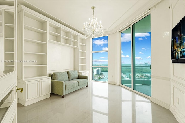 interior space with crown molding, floor to ceiling windows, an inviting chandelier, and built in features