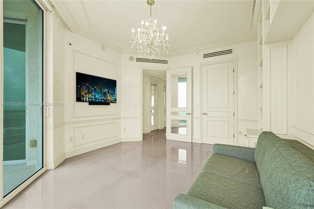 unfurnished living room with ornamental molding, marble finish floor, visible vents, and a decorative wall