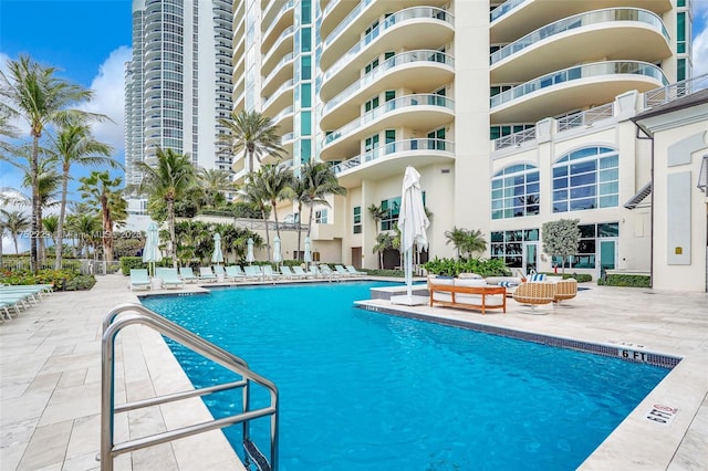 pool featuring a patio area