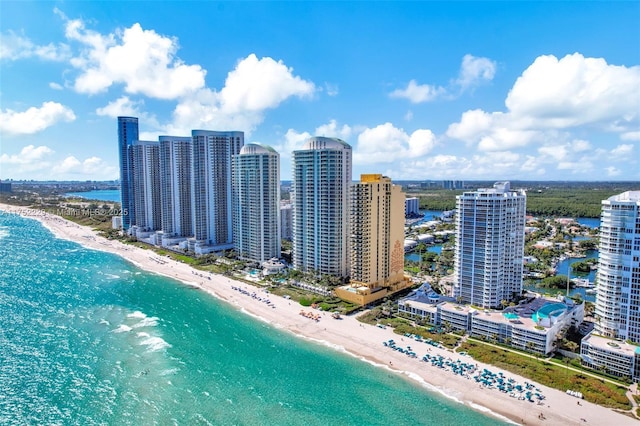 aerial view featuring a water view and a view of the beach