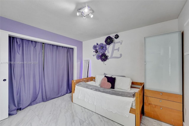 bedroom with marble finish floor