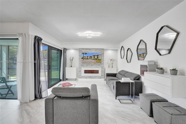 living room with marble finish floor and a fireplace