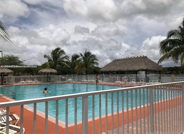 community pool with fence