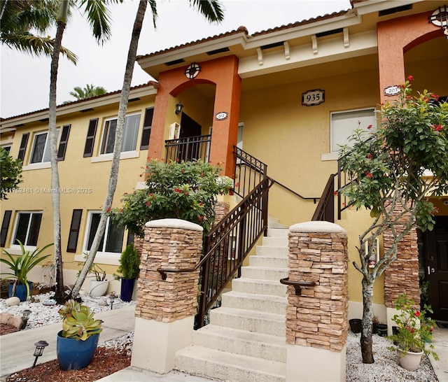 view of property with stairway