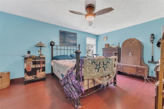 8601 Bridle Path Ct Unit 222, Davie, FL 33328 - bedroom with wood finished floors, a textured ceiling, and a ceiling fan