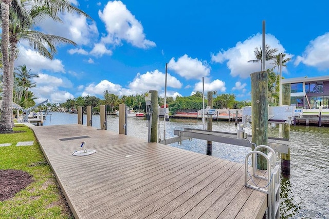 view of dock featuring a water view and boat lift