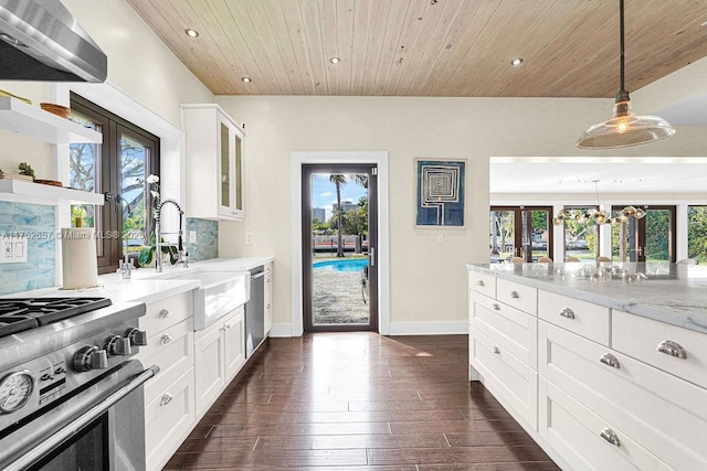 kitchen with white cabinetry, french doors, open shelves, glass insert cabinets, and pendant lighting