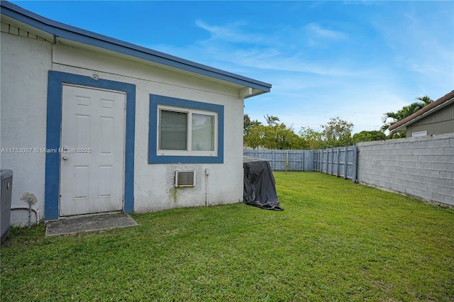 exterior space with a fenced backyard