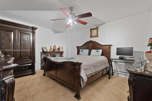 bedroom with a ceiling fan and light tile patterned floors