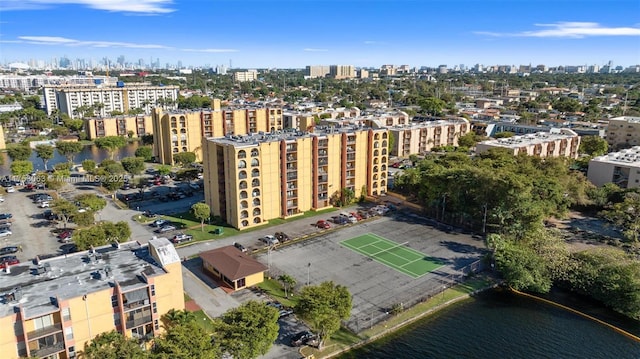 drone / aerial view with a view of city and a water view