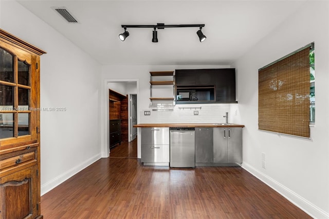 kitchen featuring dark wood-style floors, tasteful backsplash, visible vents, and open shelves