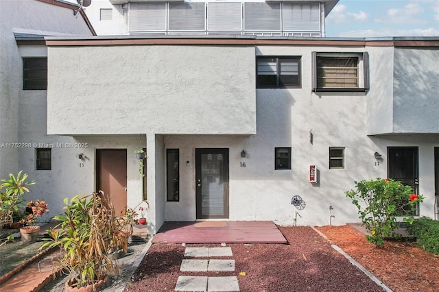 view of front of home with stucco siding