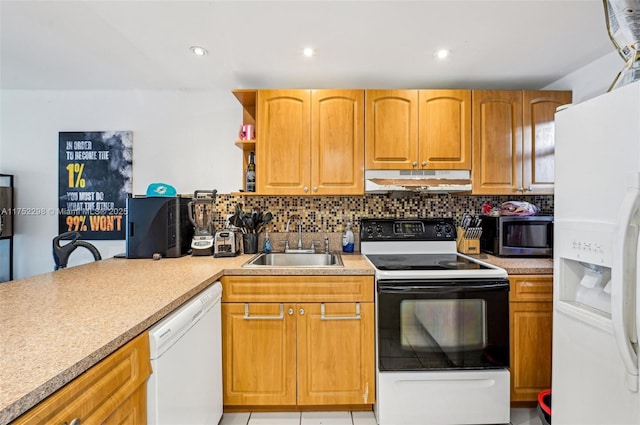 kitchen with white appliances, light countertops, under cabinet range hood, open shelves, and a sink