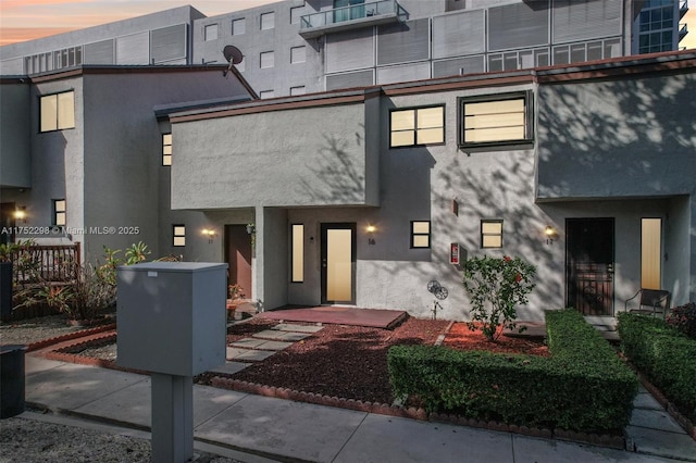 view of front of home featuring stucco siding