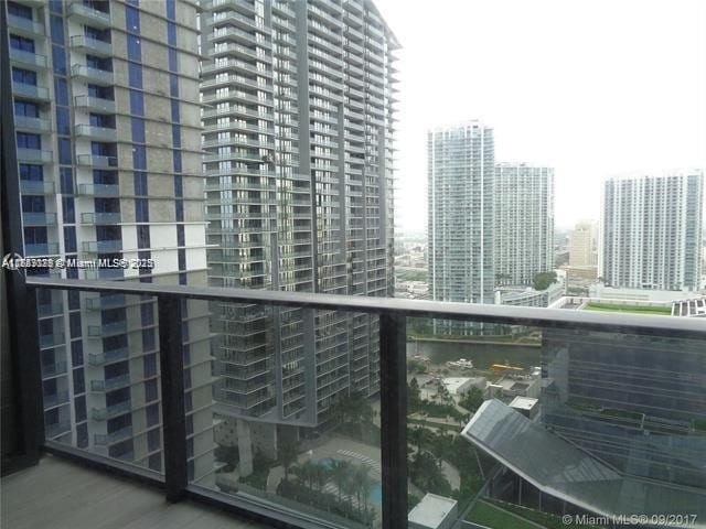 balcony featuring a city view