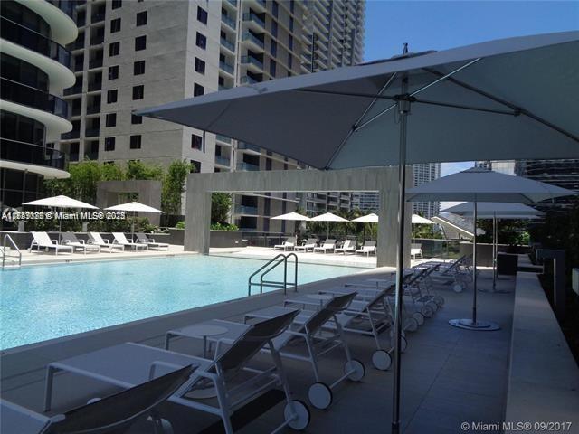 pool with a patio area