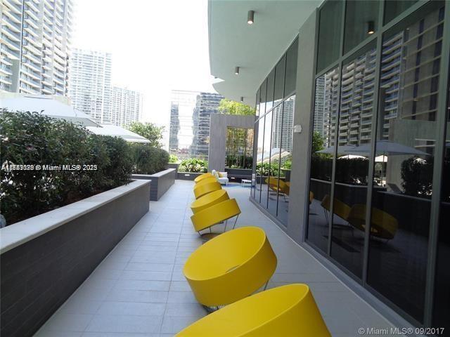 balcony featuring a city view