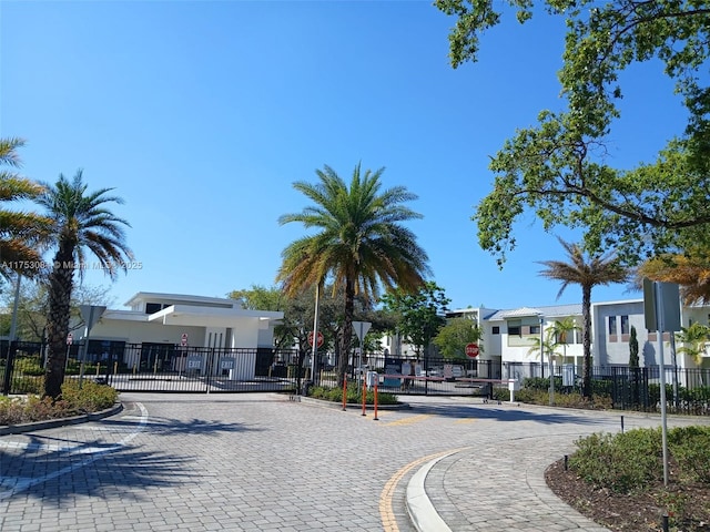 exterior space featuring fence and a gate