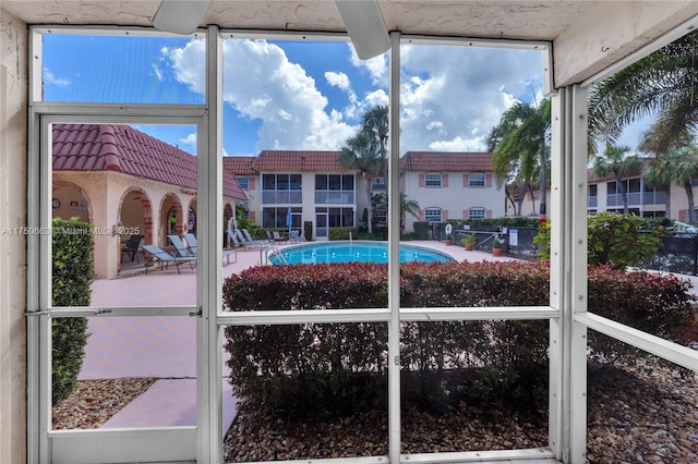 community pool featuring a patio area