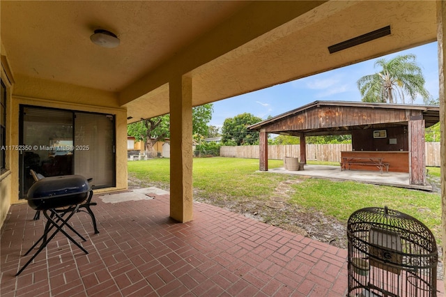 view of patio featuring area for grilling, a gazebo, and fence private yard