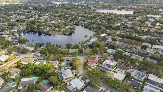 aerial view with a water view and a residential view