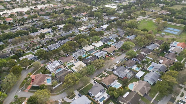 aerial view featuring a water view and a residential view