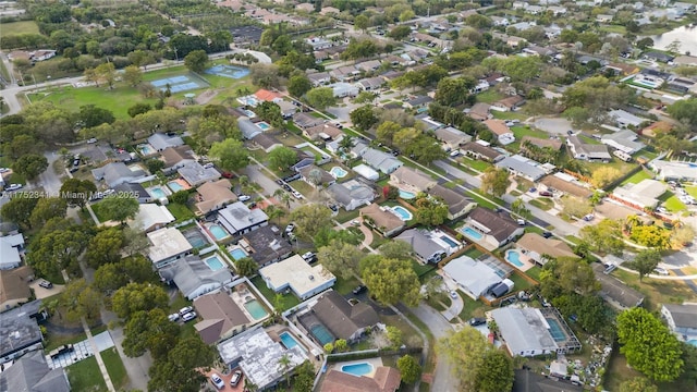 birds eye view of property with a residential view