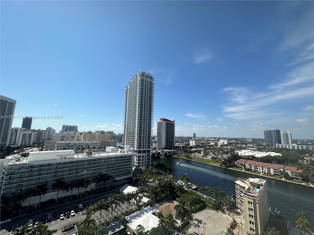 property's view of city featuring a water view