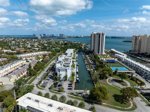 drone / aerial view with a view of city and a water view