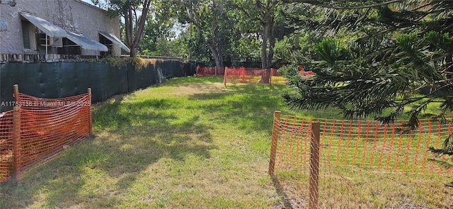 view of yard featuring fence