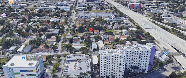 birds eye view of property with a city view