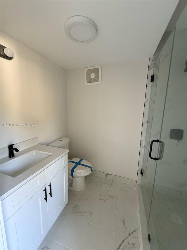 full bath featuring marble finish floor, a marble finish shower, visible vents, toilet, and vanity