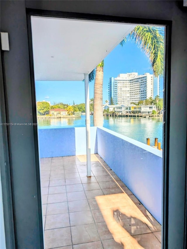 balcony featuring a water view