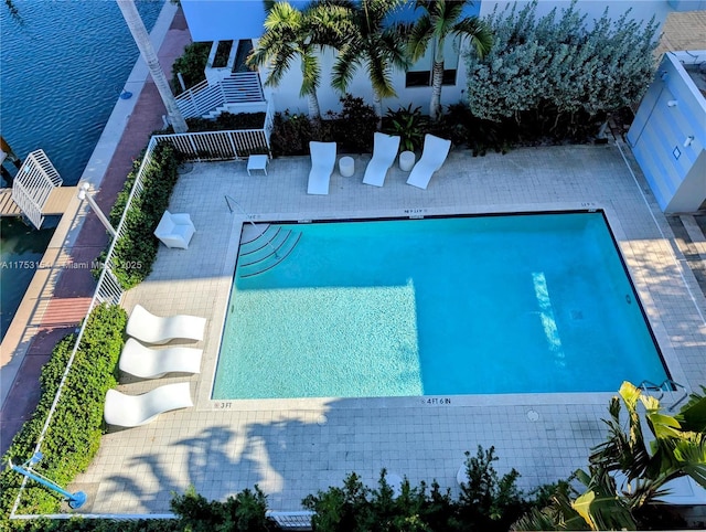 community pool featuring a water view