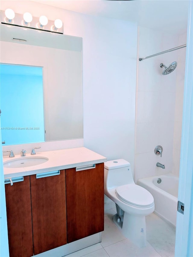 bathroom with toilet, tile patterned flooring,  shower combination, and vanity