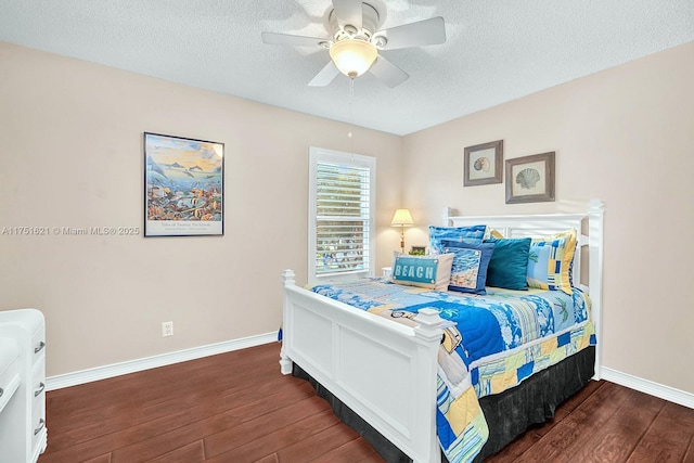 bedroom with ceiling fan, a textured ceiling, baseboards, and wood finished floors