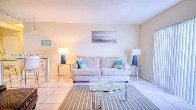 2900 Banyan St Unit 408, Fort Lauderdale, FL 33316 - living area featuring light tile patterned floors and baseboards
