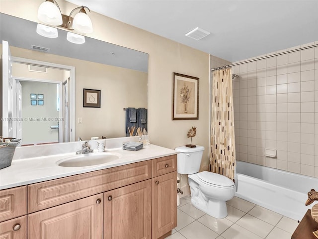 full bath with toilet, vanity, tile patterned flooring, and visible vents