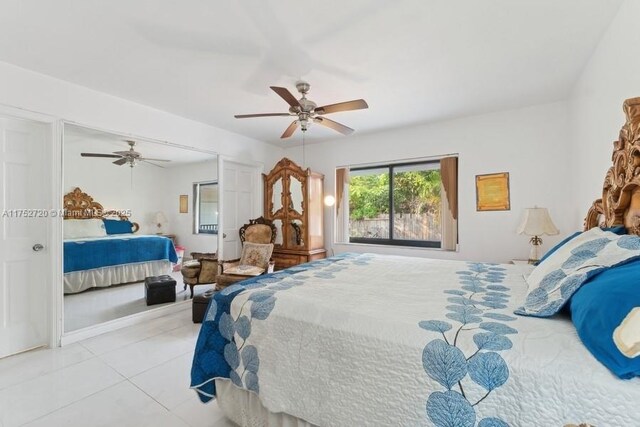 bedroom with tile patterned floors and ceiling fan