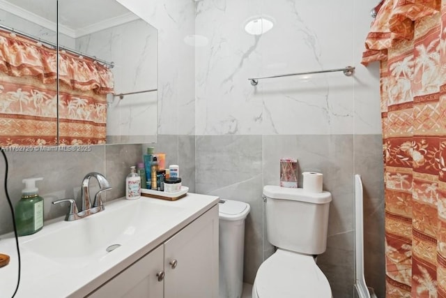 bathroom with ornamental molding, toilet, a shower with shower curtain, and vanity
