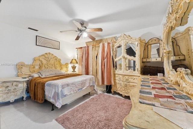 bedroom featuring visible vents and a ceiling fan