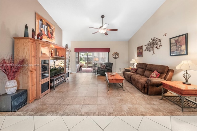 living room with high vaulted ceiling, light tile patterned floors, and ceiling fan