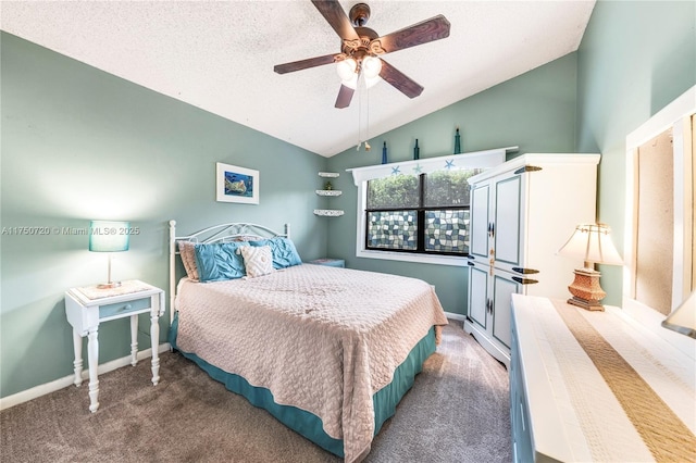 bedroom featuring lofted ceiling, baseboards, a ceiling fan, and carpet flooring