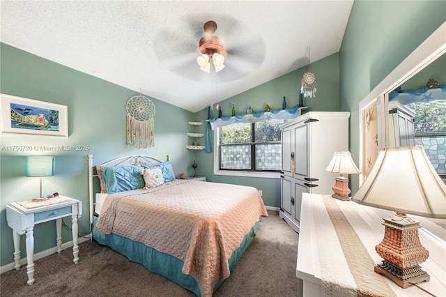 bedroom with lofted ceiling, a textured ceiling, carpet floors, a ceiling fan, and baseboards