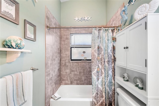 bathroom featuring toilet and shower / tub combo with curtain