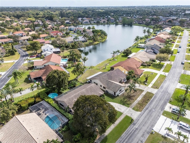 aerial view with a residential view and a water view