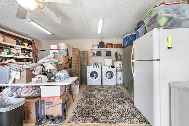 laundry area featuring electric water heater, ceiling fan, a textured ceiling, laundry area, and independent washer and dryer